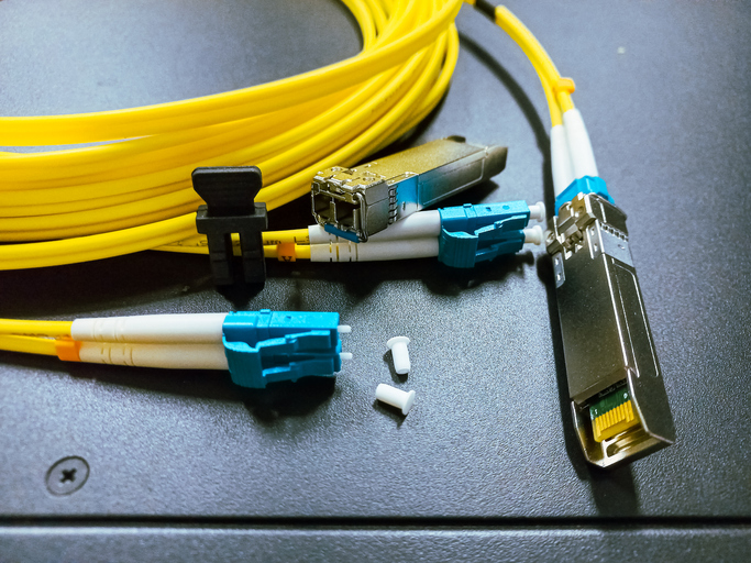 SFP optical transceiver modules and single mode fiber patch cords, the hardware behind the copper to optical transition.